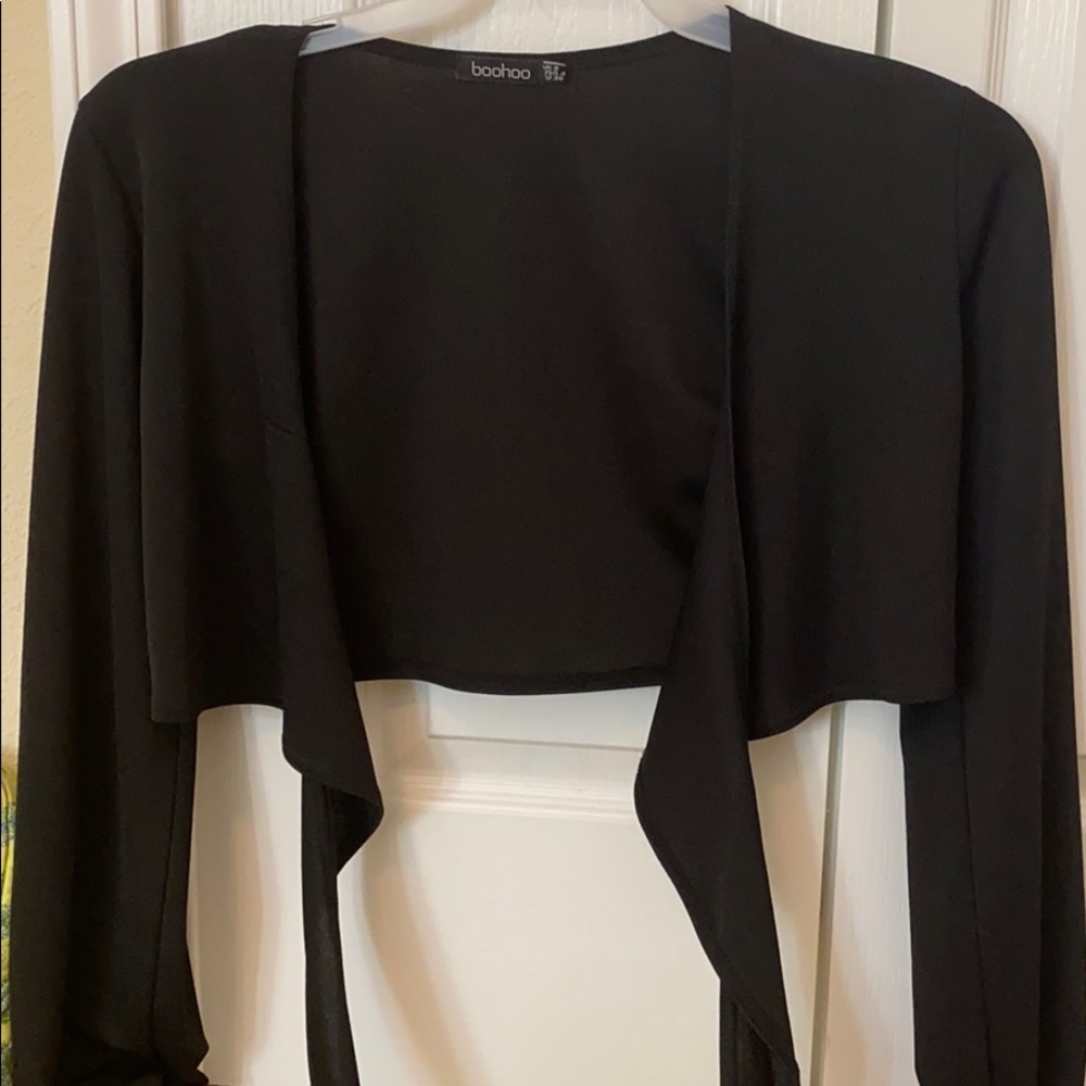 A black long sleeve silky crop top